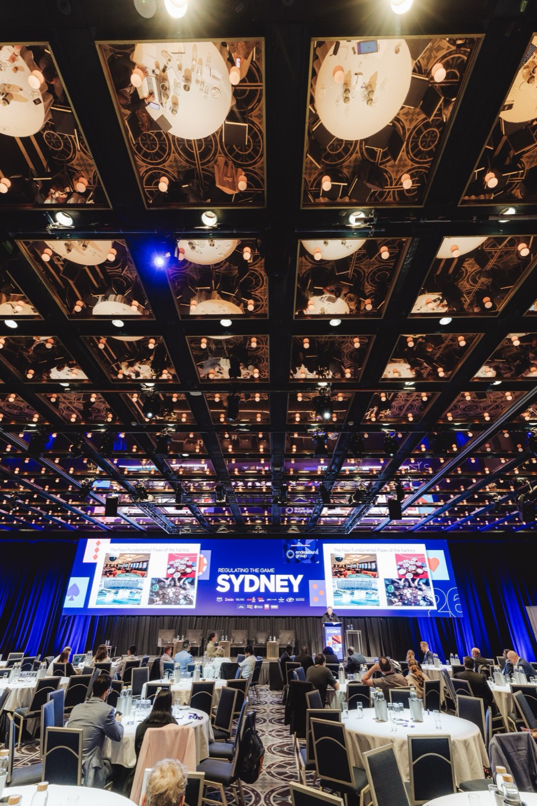 Ballroom set for a gala dinner with Sydney stage screens