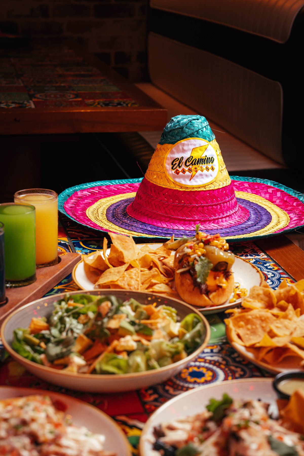 Nachos, tacos and a sombrero at a cantina-style dinner
