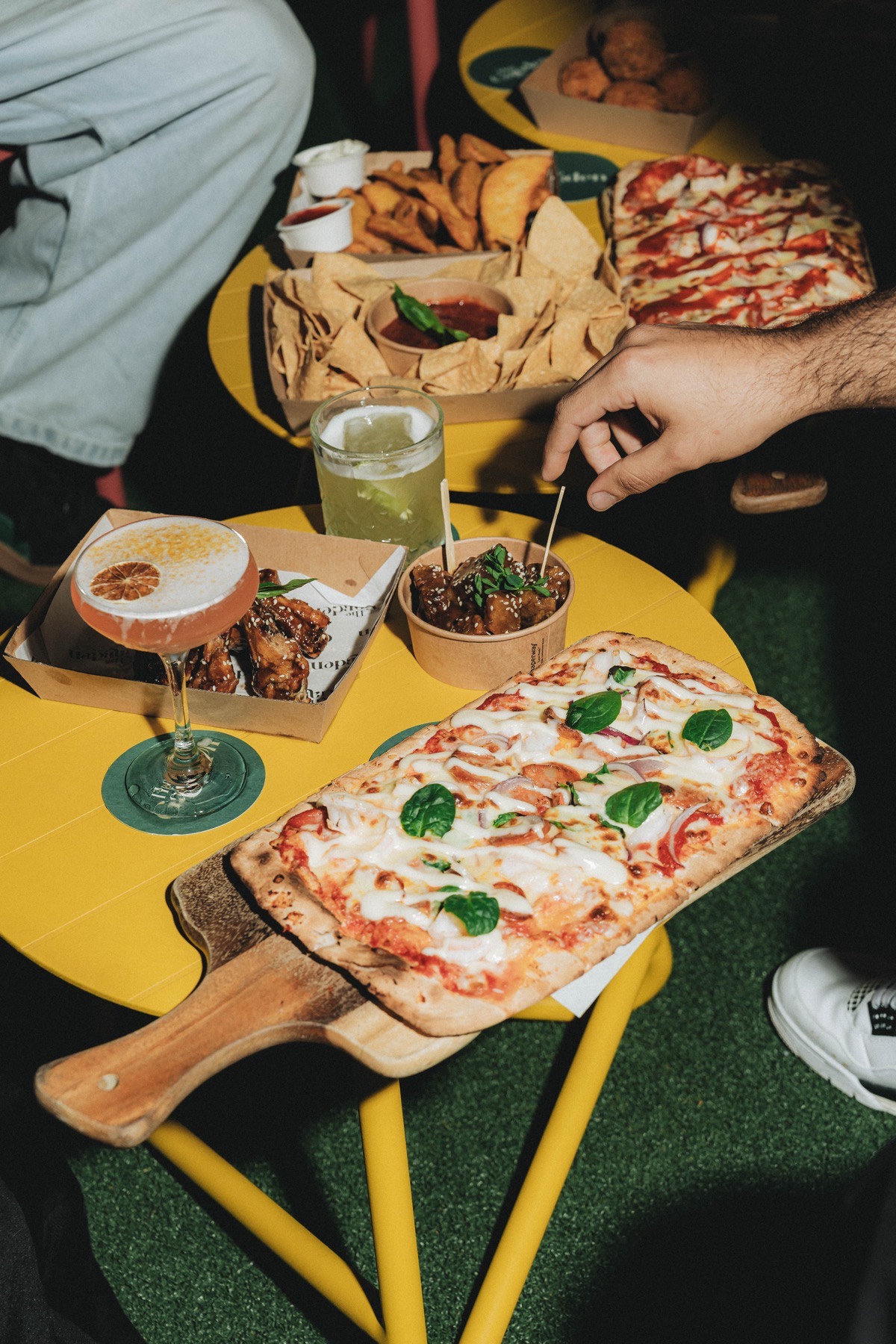 Overhead pizza spread at The Garden