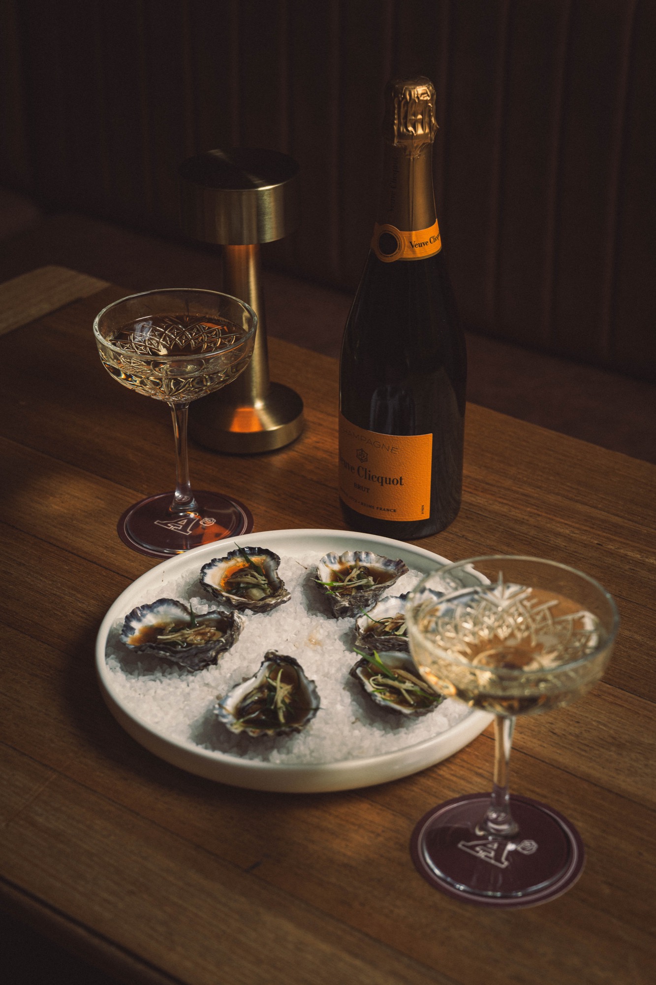 Champagne and fresh oysters at a private dining event